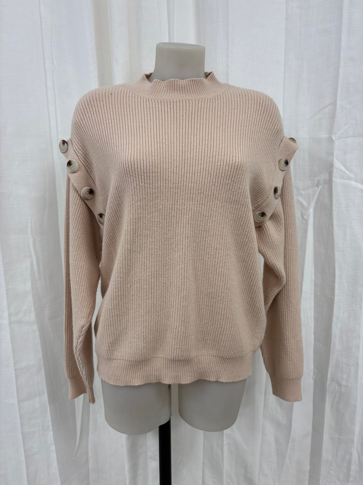 Pull beige à boutons